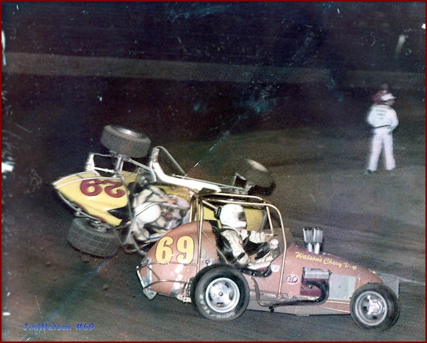 Jim Watson Midget Race Car Chevy V-4 #69 avoids crash with another Midget Race Car #29